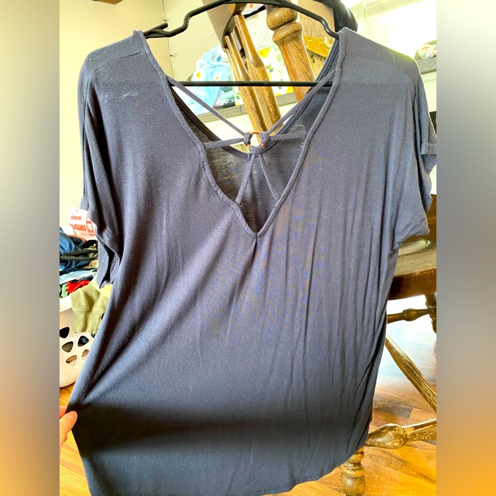 Stitch fix shirt. Design on the back. Open back.